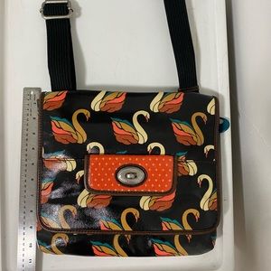 New Fossil swan purse teal salmon on black back background. Brass hardware